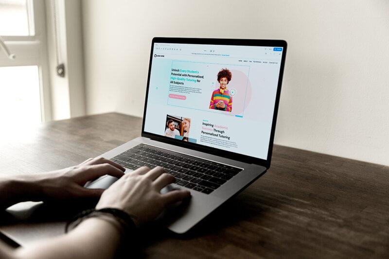 photo of someone using the webpage builder feature of Hi5 Connect